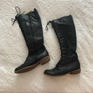 Knee high black lace up boots